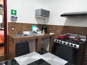 Fridge, microwave, oven, cookware/dishes/utensils