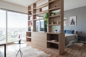 Deluxe Apartment, Balcony, River View | Living area - MOT Azopardo 700 (Buenos Aires)