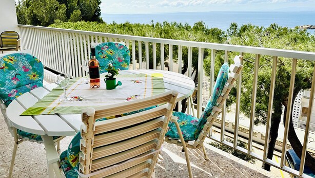 Outdoor dining - 3387 - EL CORSARIO,B-4, SEA VIEW, QUIET AREA, IN THE COVE OF ALMADRABA OF CRYSTAL WATER. NEAR TO THE BEACH. (Roses)
