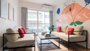 Departamento Confort, vista a la ciudad | Área de sala de estar