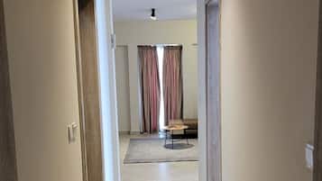 Deluxe Suite, City View | 1 bedroom, blackout drapes, iron/ironing board, free WiFi