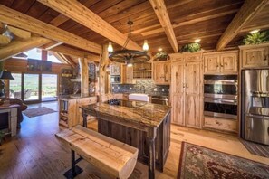Microwave, oven, stovetop, dishwasher - Red Roof Ranch, is located on 15 acres with stunning mountain and lake views! (Cody)