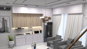 A modern living space with a kitchen, seating area, and a staircase. - Shorlets by First Bridgeford Homes (Lekki)