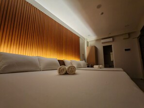 Family Double Room | Premium bedding, desk, laptop workspace, iron/ironing board - ZenSuites hotel Tacloban (Tacloban)