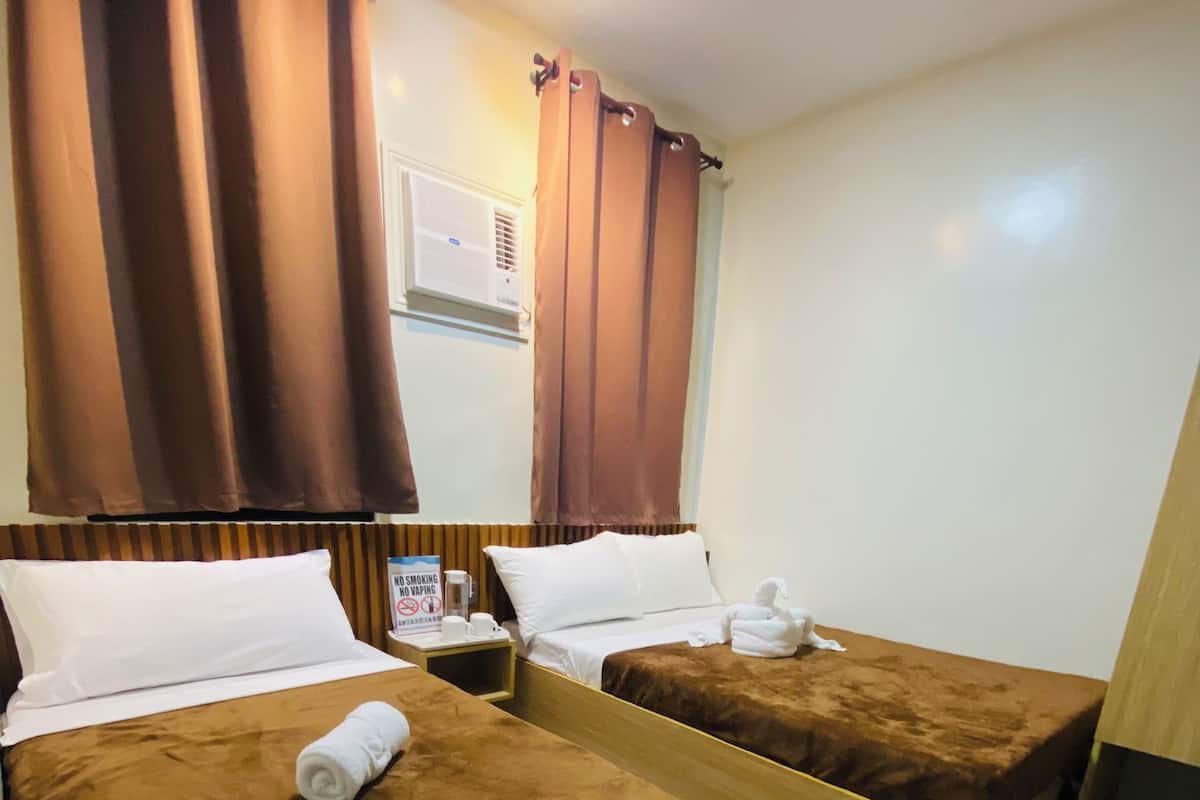 Standard Triple Room | Premium bedding, desk, laptop workspace, iron/ironing board