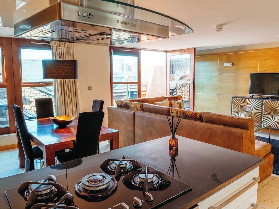 Penthouse, Balcony, City View | Private kitchen | Full-sized fridge, microwave, oven, stovetop