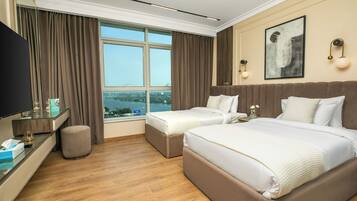 Deluxe Tek Büyük veya İki Ayrı Yataklı Oda | Mısır pamuklu çarşaf takımı, kaliteli yatak takımı