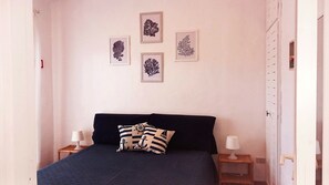 1 habitación, tabla de planchar con plancha, wifi gratis y ropa de cama 