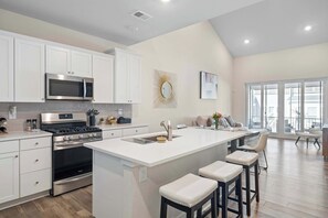 Townhome, Multiple Beds, Patio, Garden View (Milos Haven) | Private kitchen | Fridge, microwave, oven, stovetop