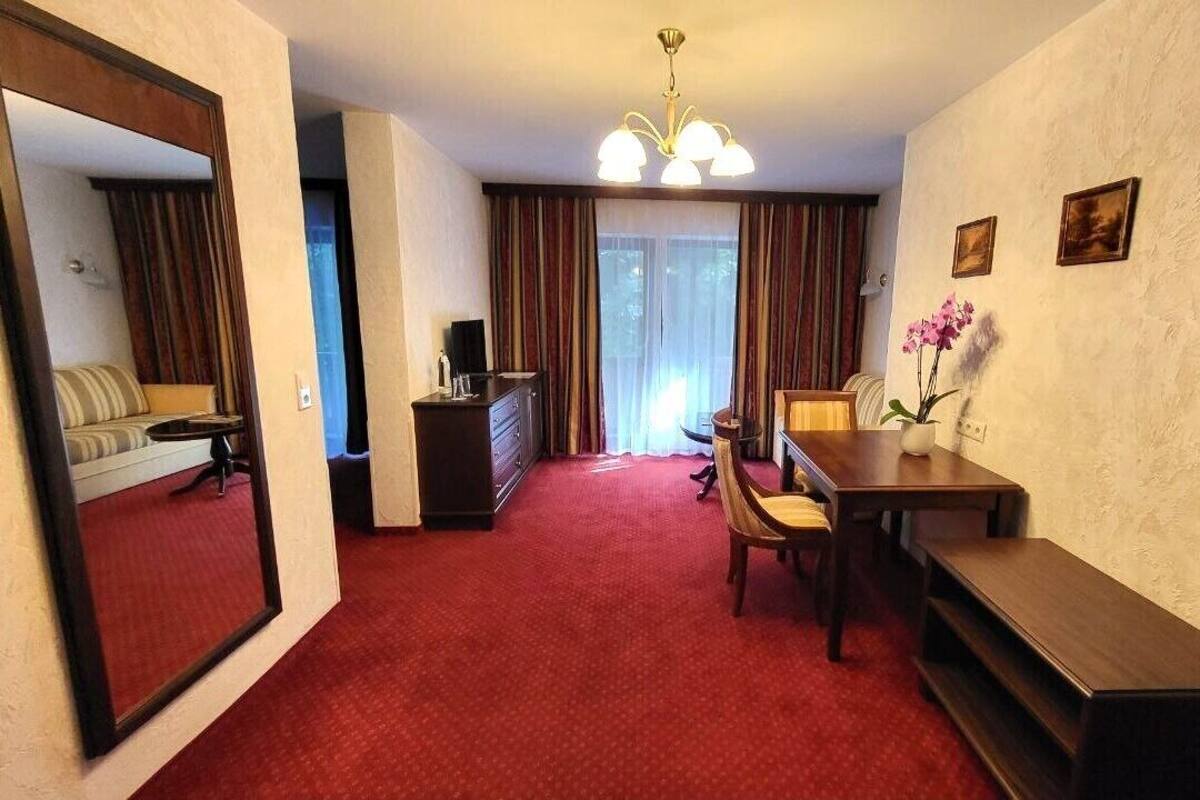 Suite, 1 Bedroom, Balcony, Garden View | Minibar, in-room safe, desk, WiFi (free)