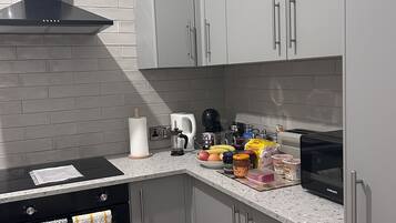 Fridge, microwave, oven, coffee/tea maker