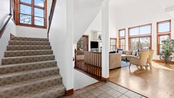 Smart TV, fireplace, books, offices