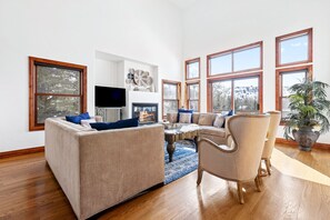 Smart TV, fireplace, books, offices