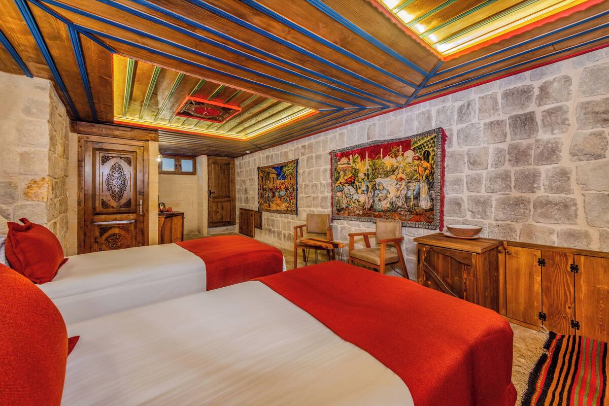 Underground Family Room | Select Comfort beds, minibar, laptop workspace, WiFi (free)