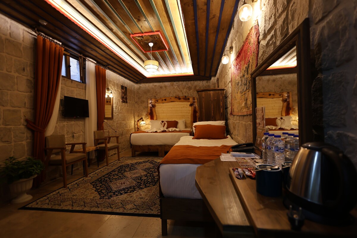 Underground Triple Room Without Windows | Select Comfort beds, minibar, laptop workspace, free WiFi