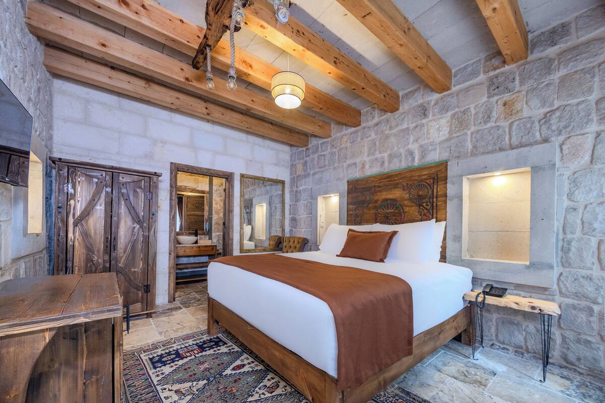 Superior Stone Room | Select Comfort beds, minibar, laptop workspace, WiFi (free)
