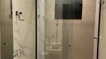 Bidet, towels, toilet paper