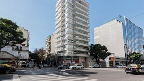 A multi-story building with a modern design, featuring balconies on each floor. - MOT Libertador 5700 (Buenos Aires)