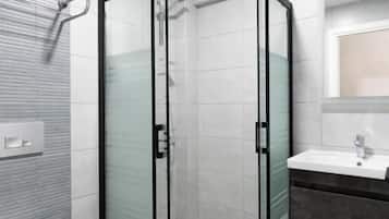Shower, free toiletries, hair dryer, towels