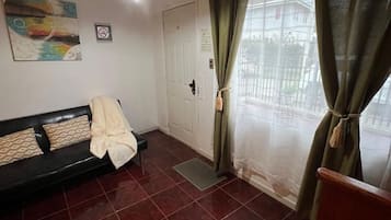 Apartment, Patio | Living area | Flat-screen TV