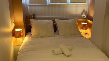 1 slaapkamer, een strijkplank/strijkijzer, wifi, beddengoed