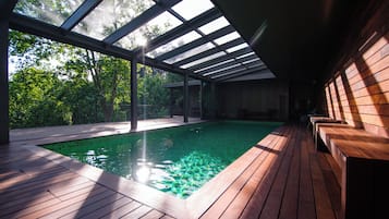 Indoor pool, outdoor pool, pool umbrellas, pool loungers