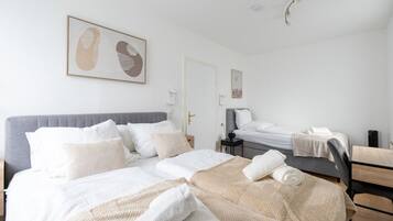 1 bedroom, desk, iron/ironing board, travel cot