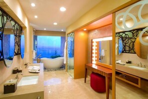 Shower, jetted bath, hair dryer, towels