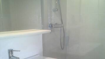 Shower, hair dryer, toilet paper