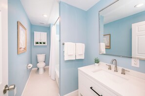 Hair dryer, towels, soap, shampoo