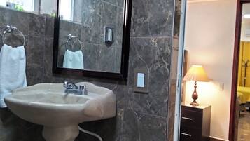 Hair dryer, towels, soap, shampoo