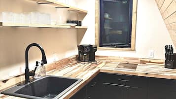 Fridge, microwave, stovetop, coffee/tea maker