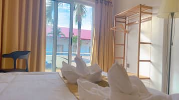 Premium bedding, pillowtop beds, laptop workspace, rollaway beds