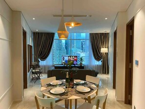 Appartement Deluxe, vue ville | Coin séjour