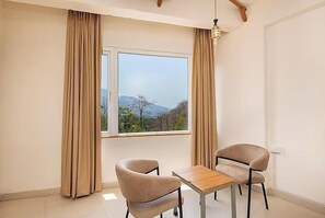 Deluxe Double Room, Mountain View | 1 bedroom, desk, free WiFi, bed sheets