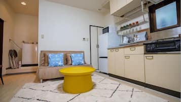 Comfort Apartment, Non Smoking (201) | Living area | 15-cm TV with cable channels