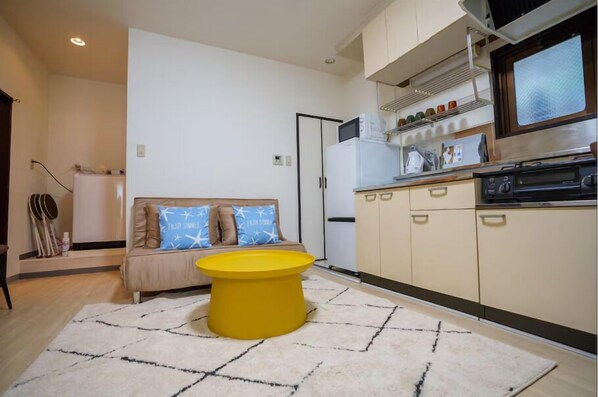 Comfort Apartment, Non Smoking (201) | Living area | 15-cm TV with cable channels