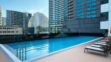 Seasonal outdoor pool, pool umbrellas, sun loungers