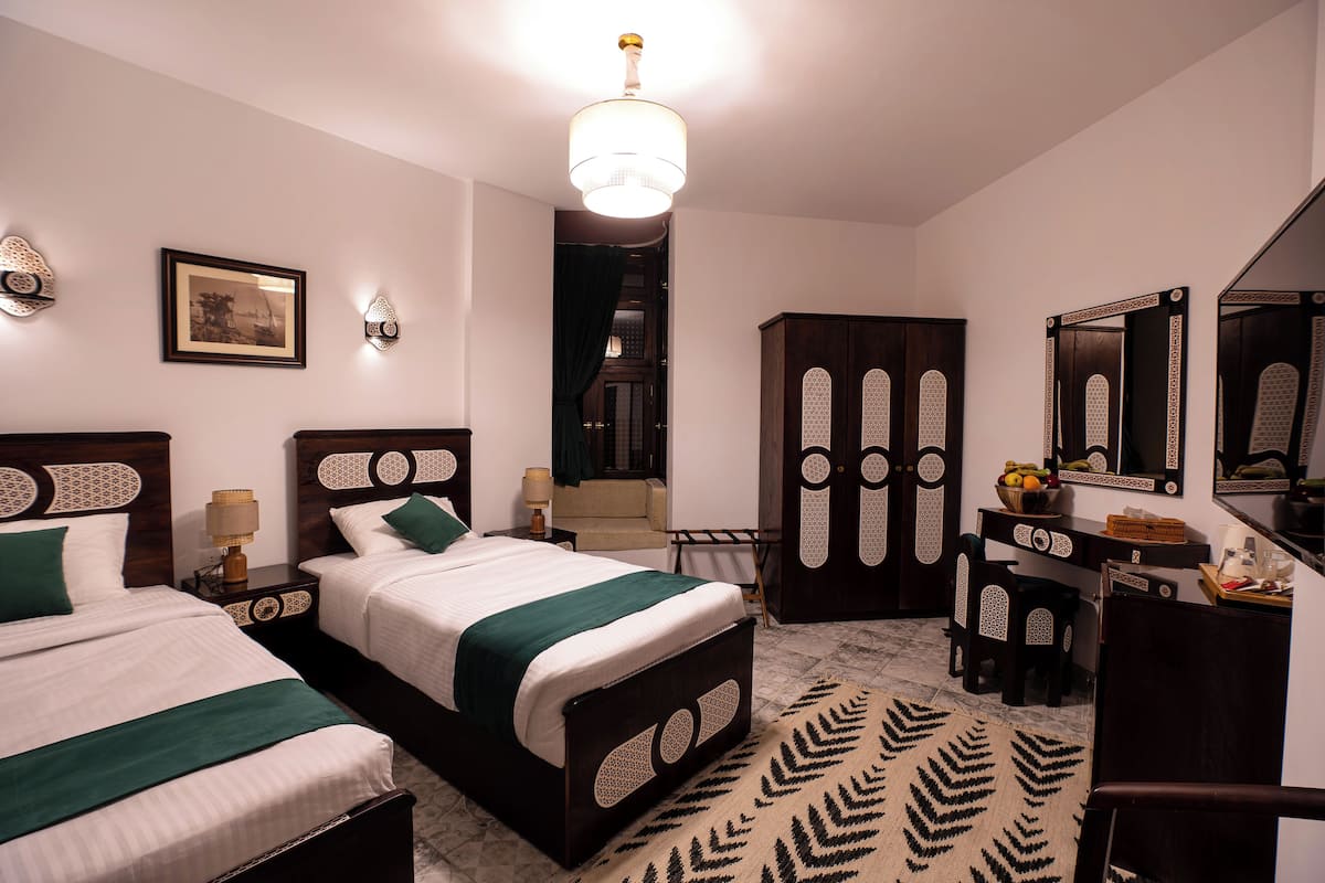 Habitación estándar con 1 cama matrimonial o 2 individuales | 1 habitación, ropa de cama de alta calidad y camas con efecto memoria