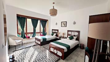 Junior Suite, Garden View | Premium bedding, memory-foam beds, free minibar, in-room safe