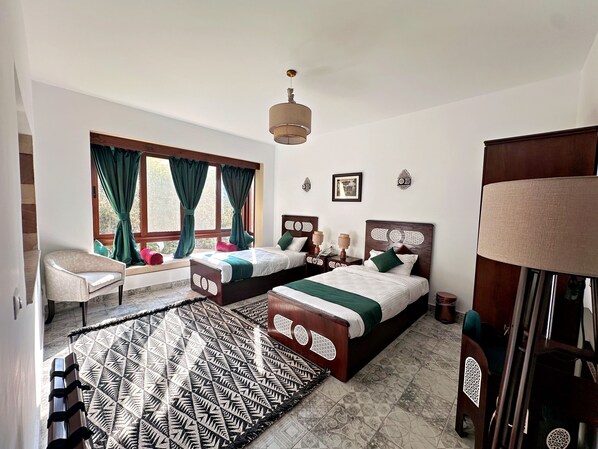 Junior Suite, Garden View | Premium bedding, memory foam beds, free minibar, in-room safe - Villa Mango Hotel (New Cairo)