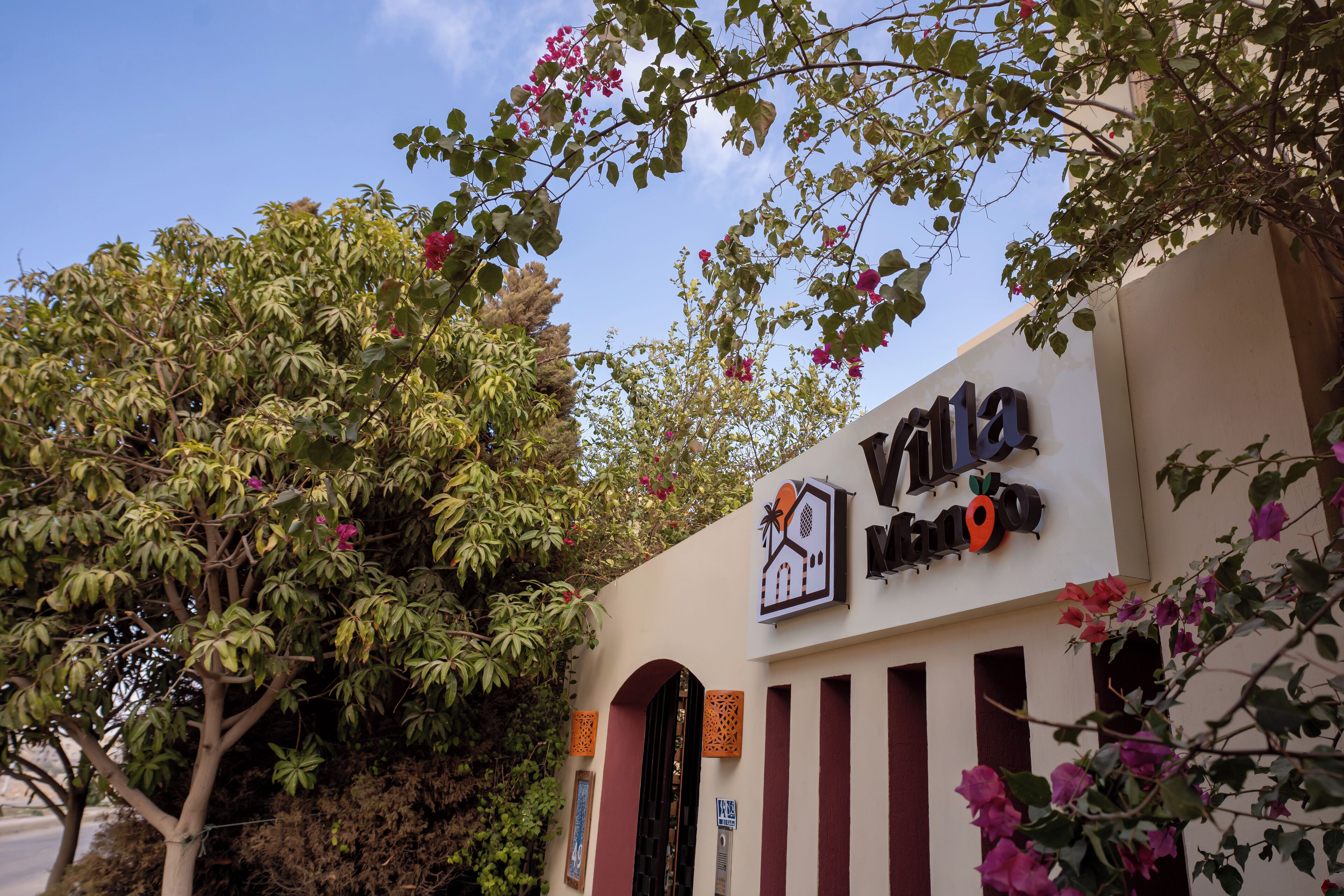 A building with a sign that reads "Villa 12".