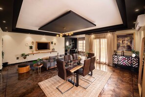 Basic Apartment | Dining - Xuru Stays I The Bold Parisian House - Steps From The Best Mall in Cairo (New Cairo)