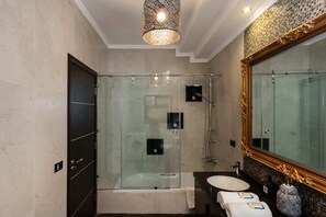 Basic Apartment | Bathroom | Eco-friendly toiletries, hair dryer, towels, soap - Xuru Stays I The Bold Parisian House - Steps From The Best Mall in Cairo (New Cairo)