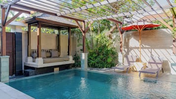 Outdoor pool, pool umbrellas, pool loungers