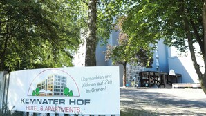 A sign for 'KEMNATER HOF HOTEL & APARTMENTS' with a depiction of a building and trees. - Two-room PREMIUM apartment (Ostfildern)