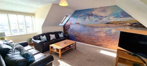 Smart TV, DVD player, livros