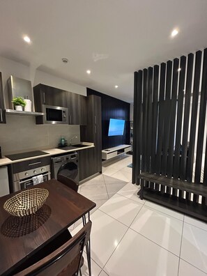 Deluxe Studio Suite, Courtyard View | Individually decorated, desk, laptop workspace, blackout drapes - Embassy Gardens Haven (Accra)