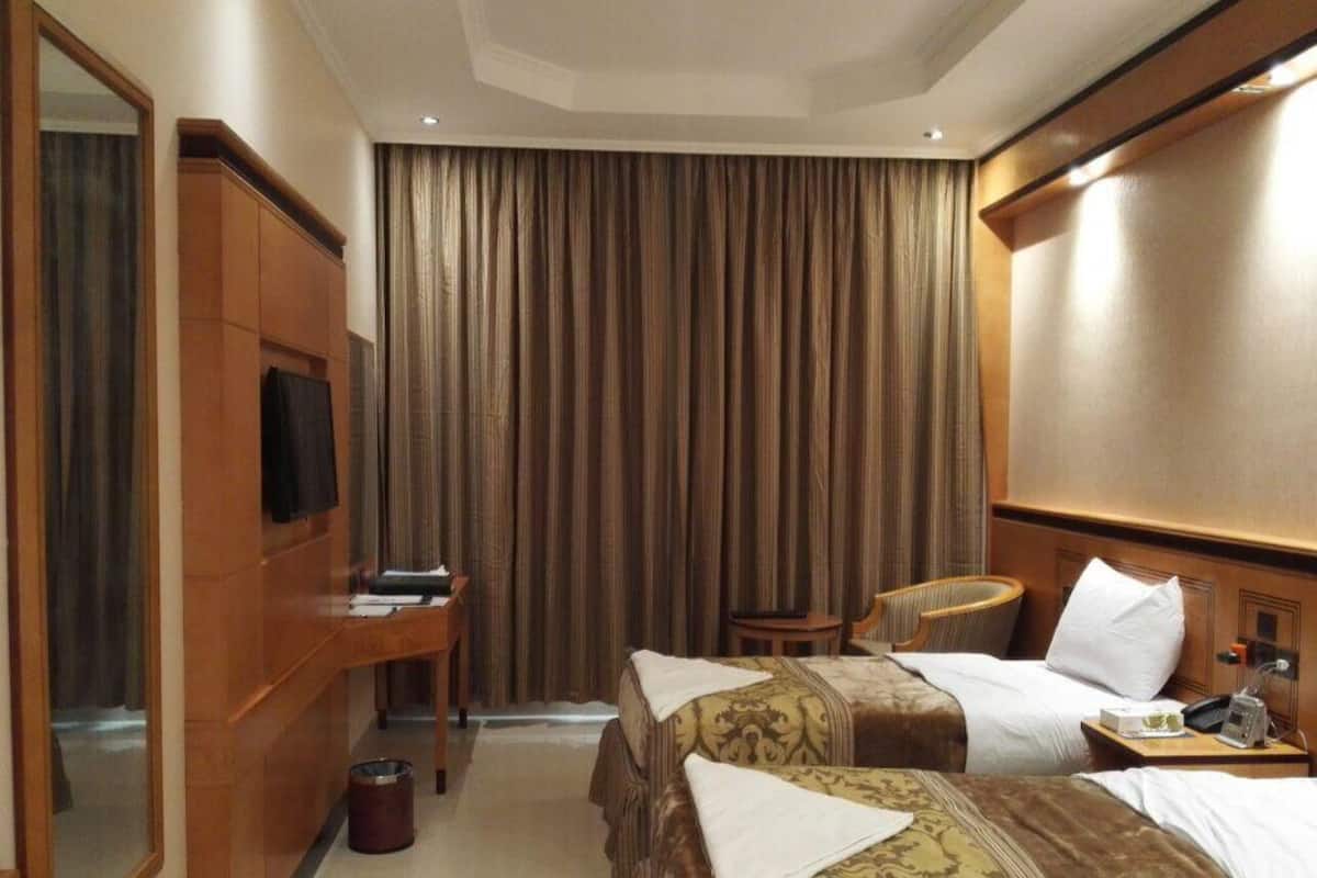 Basic Double Room, City View | In-room safe, iron/ironing board, free WiFi, bed sheets