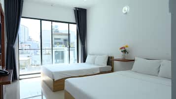Luxury Quadruple Room, 2 Queen Beds, Balcony | Minibar, desk, laptop workspace, blackout curtains